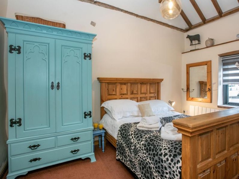 Main bedroom with king bed downstairs